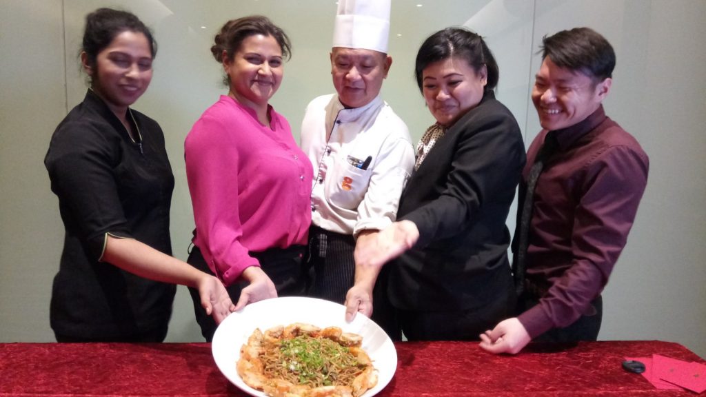 Chef Ooi (centre) with G hotel team.