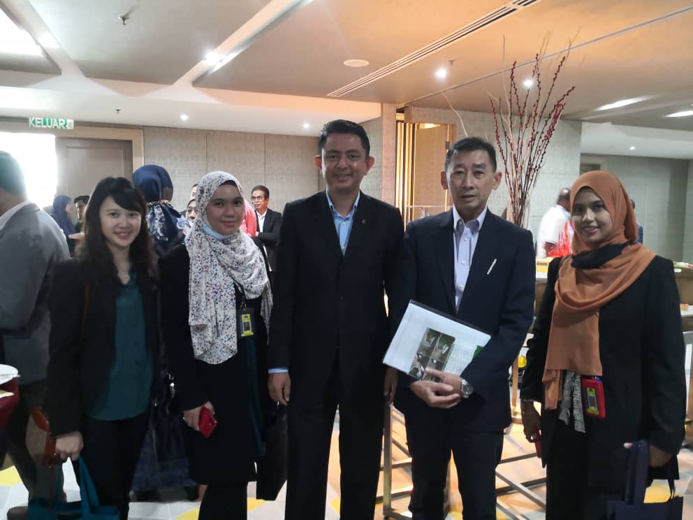 Eugene Dass (third from right) with other reps.