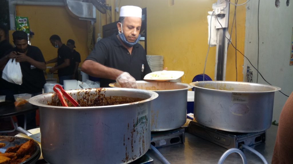 Dishing out piping hot meals.