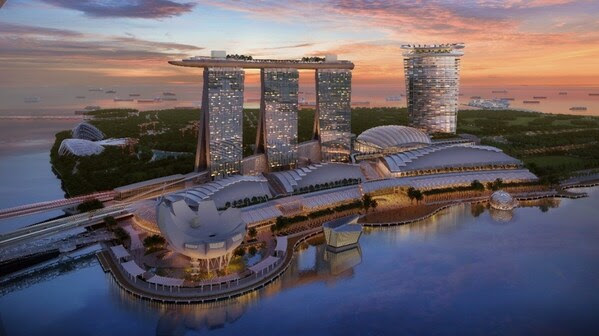 The envisioned waterfront with Las Vegas Sands’ new ultra-luxury development featuring a 55-storey hotel tower and podium with 15,000-seat arena situated adjacent to the existing Marina Bay Sands. 
(Image courtesy of Safdie Architects)